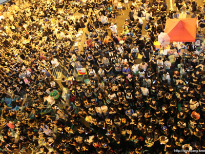 A large public gathering viewed from above in Hong Kong